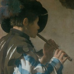 image of boy playing a flute